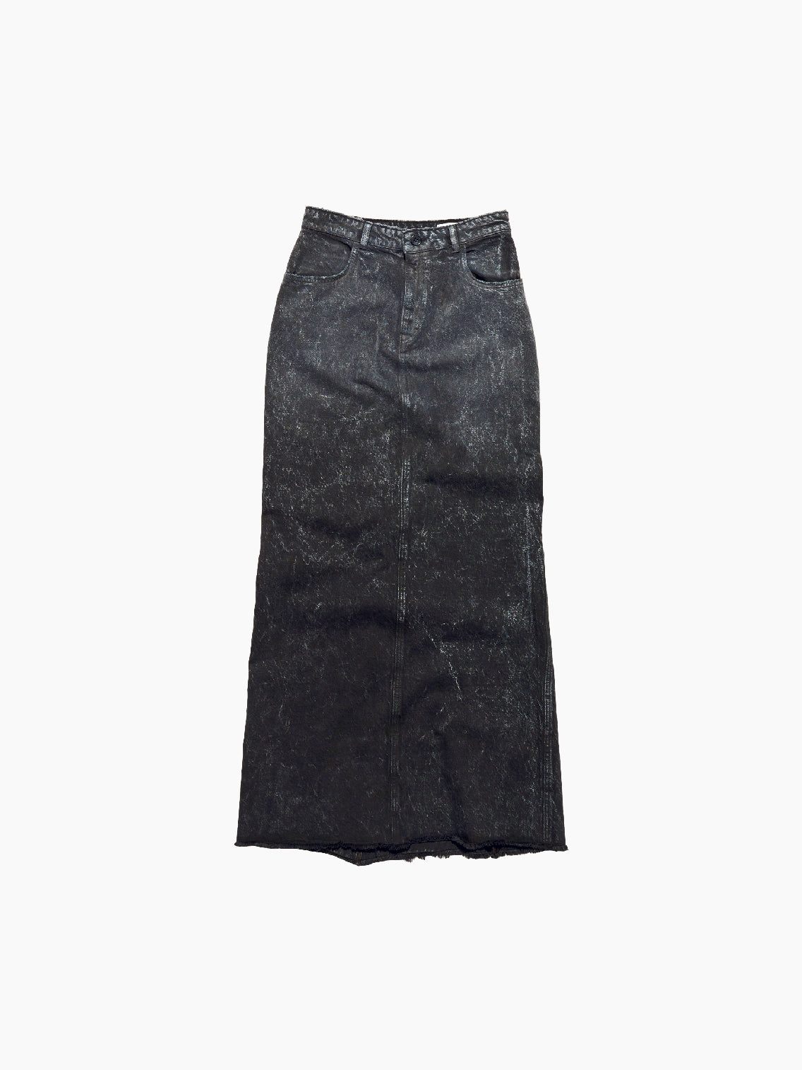 The Annul Skirt Faded Away Grey by Hope is a high-waisted, ankle-length denim skirt in a faded black wash. This long skirt features side pockets, belt loops, and a front zipper with a button closure. The hem is slightly frayed, giving it a distressed look.