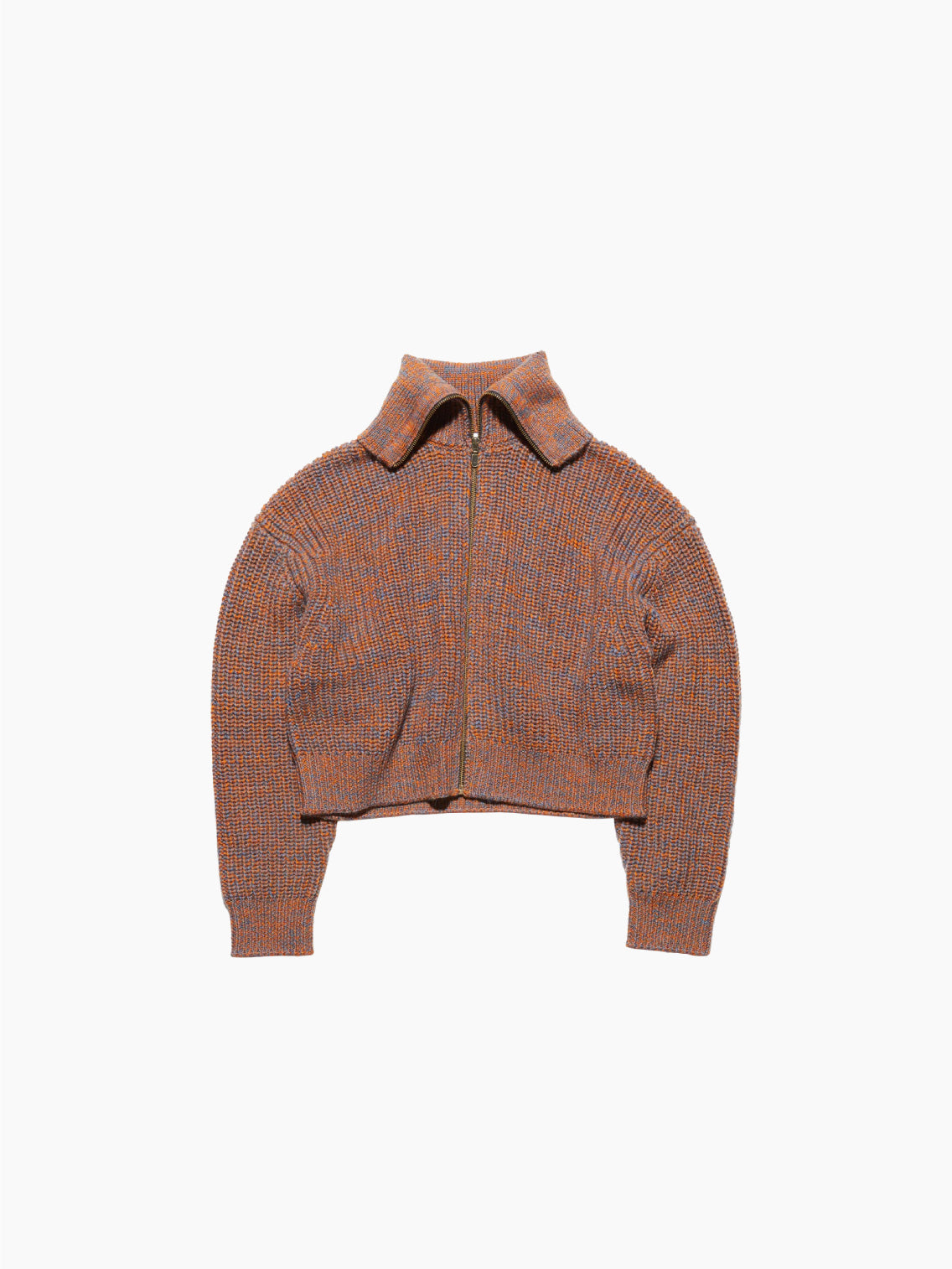The Yummy Cardigan Orange by Hope is a cropped, brown, and orange knit sweater featuring a high collar and central zipper. This bomber jacket-inspired cardigan has long sleeves, a slightly relaxed fit, and is crafted from heavy wool yarn for warmth.
