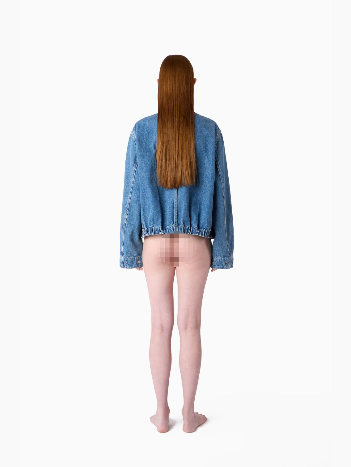 A light blue, organic bomber jacket made from raw denim, featuring a front zipper and long sleeves. The jacket includes a collar and two front pockets, exuding a casual, slightly faded look. A silicon Sunnei patch adds a unique touch, while the fabric tag inside the collar reads "Marni.
