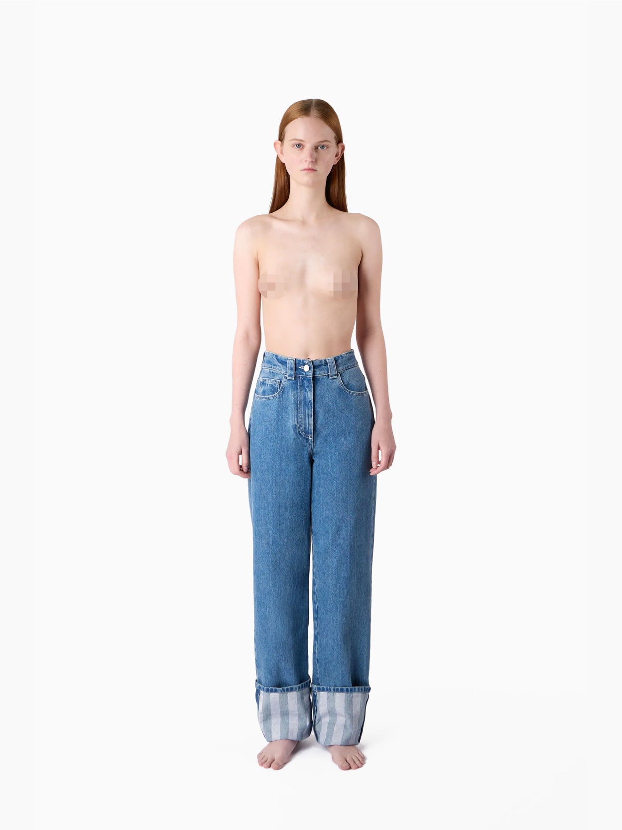 A pair of Sunnei Classic Denim Pants Washed Blue, featuring a high-waisted, straight-leg design made from organic cotton with a classic five-pocket arrangement and secured with a zip fly and button closure, laid flat on a white background.