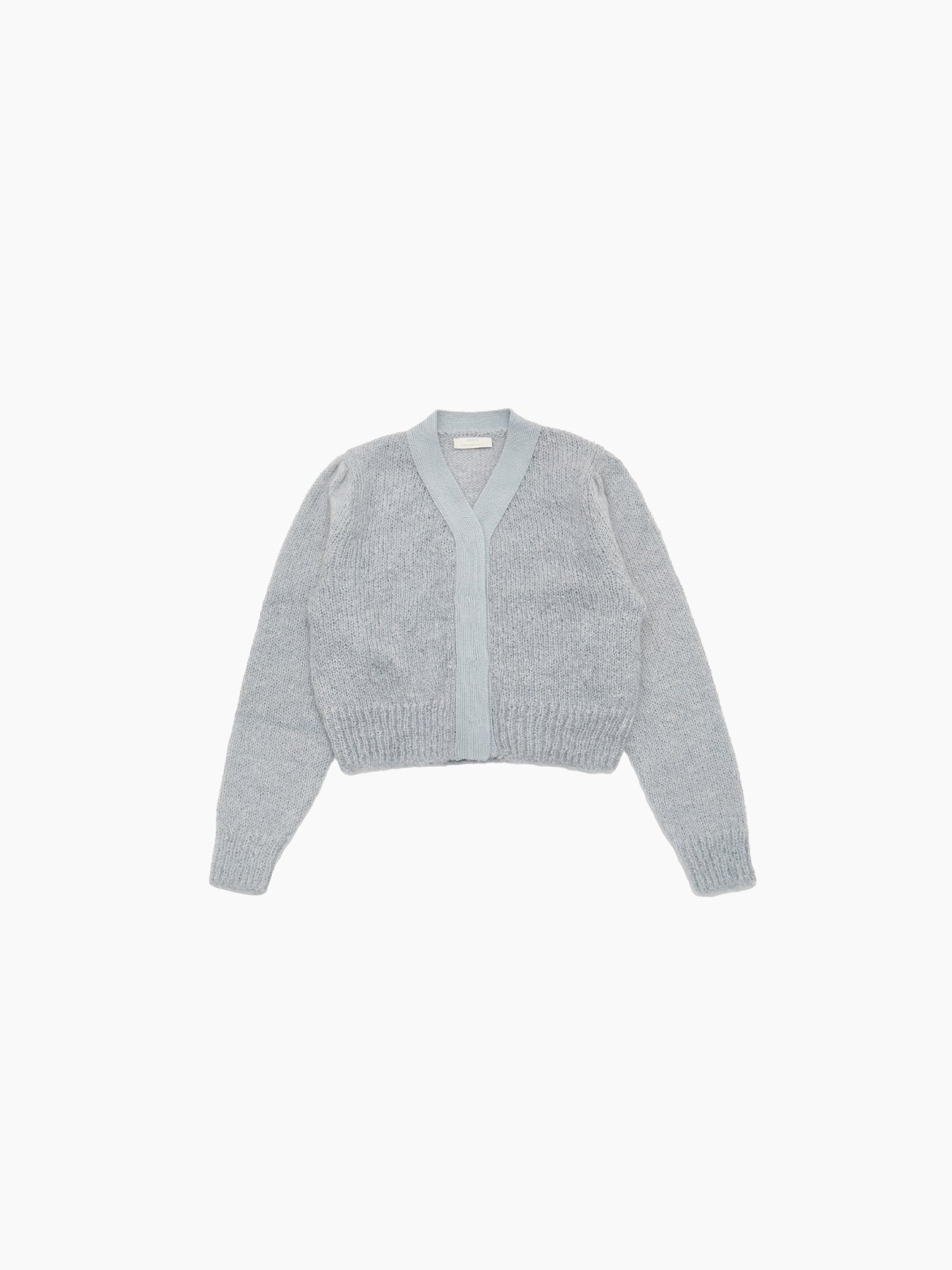 The Grandma Cardigan Light Mint from Amomento, featuring long sleeves and a V-neck, exudes a vintage feel. Laid flat on a white background, it showcases its soft texture and simple design while effortlessly retaining warmth.