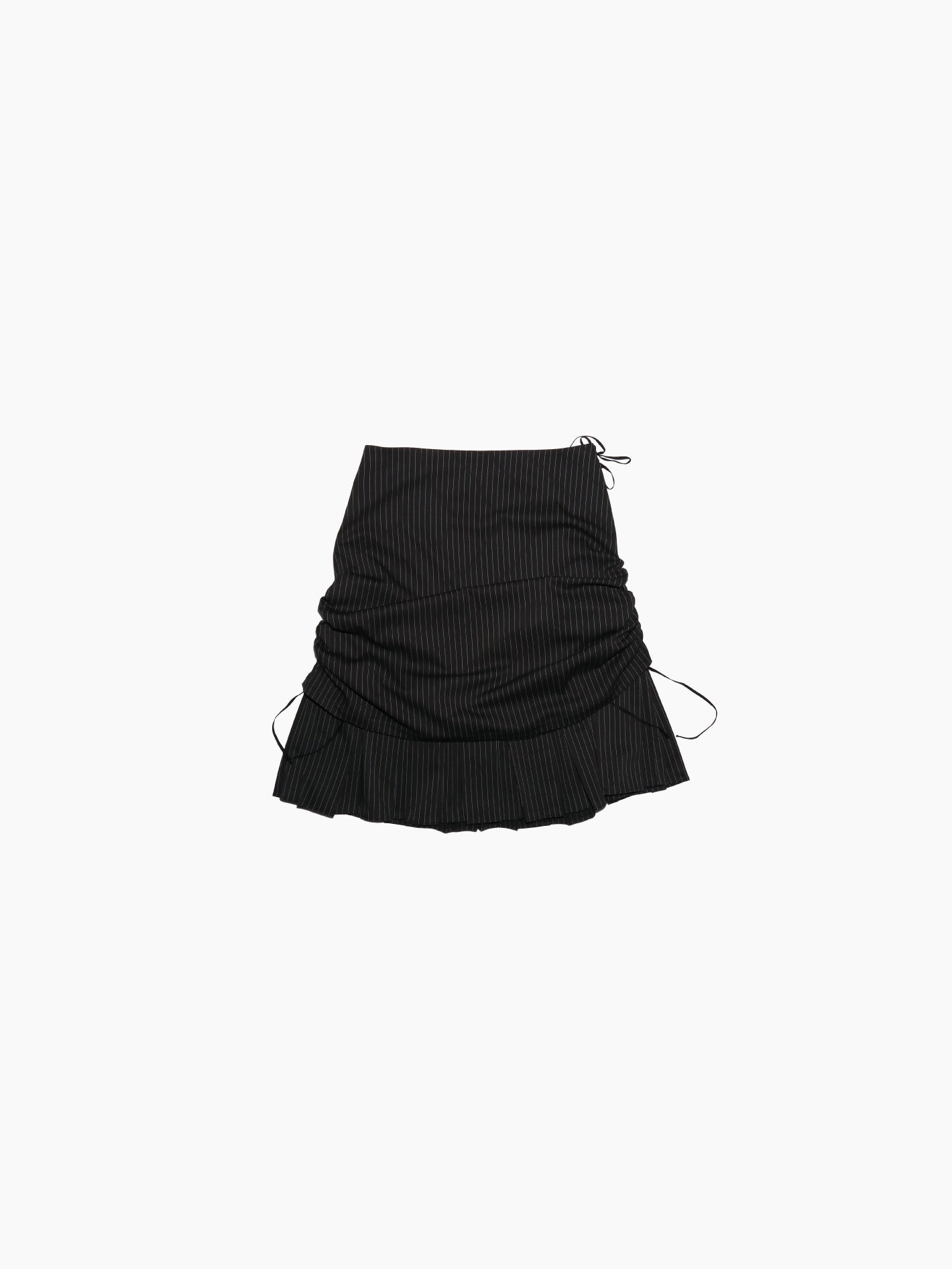 The Aurembiaix Pinstripe Pleated & Gathered Skirt is a black, pinstriped mini skirt with ruched sides and adjustable drawstrings for a side-gathered look. It features a slightly flared hem and is finished with a subtle hook-and-eye fastening for added detail against the white background.