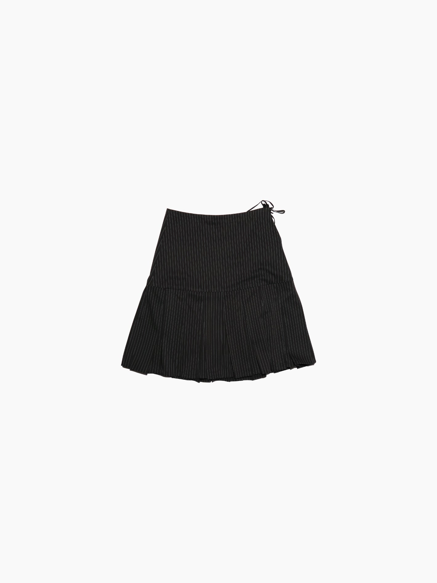 The Aurembiaix Pinstripe Pleated & Gathered Skirt is a black, pinstriped mini skirt with ruched sides and adjustable drawstrings for a side-gathered look. It features a slightly flared hem and is finished with a subtle hook-and-eye fastening for added detail against the white background.