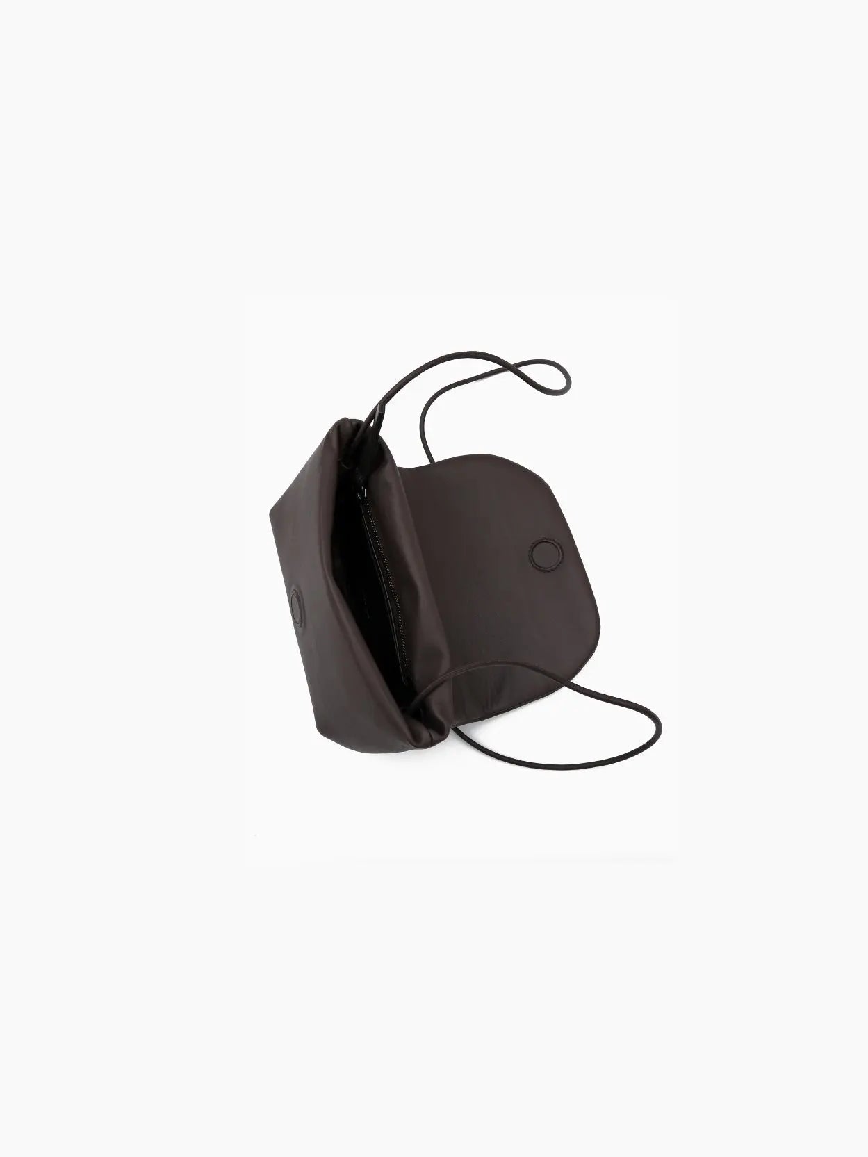 A small, dark brown leather crossbody bag with a curved flap closure. The Anonima Clutch Dark Brown by Marsèll, available at Bassalstore in Barcelona, has a smooth texture and a minimalist design against a plain white background.