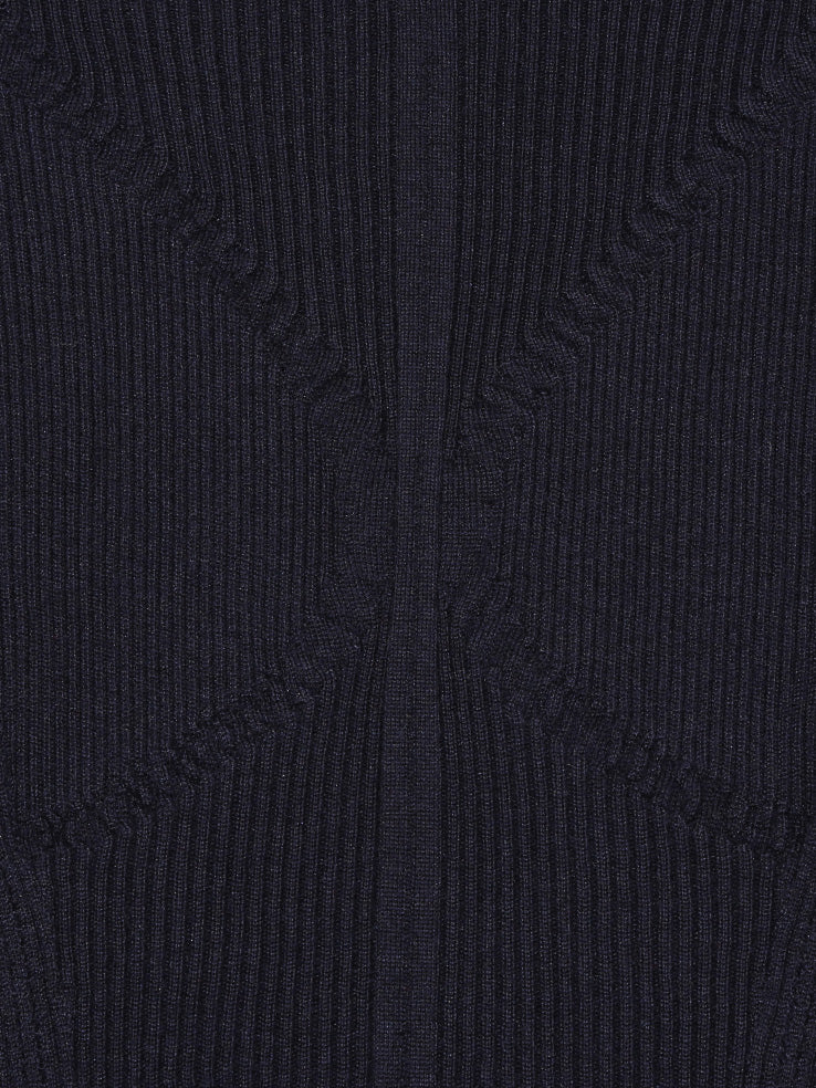 Displayed on a plain white background is the "Tisa Sweater Navy" from Bielo, a luxurious long-sleeve knit crafted with silk fibers. It features a fitted silhouette with visible ribbed details and a slightly scalloped hem, offering a second skin knitted design.