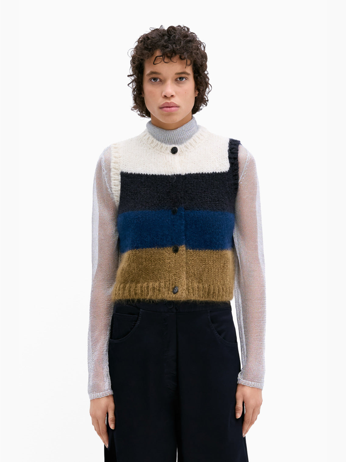 Introducing the Cordera Alpaca & Mohair Striped Waistcoat: a stylish sleeveless knitted piece adorned with horizontal stripes in cream, navy blue, black, dark blue, and brown. Crafted from luxuriously soft mohair and alpaca, it boasts a round neckline and front button closure.