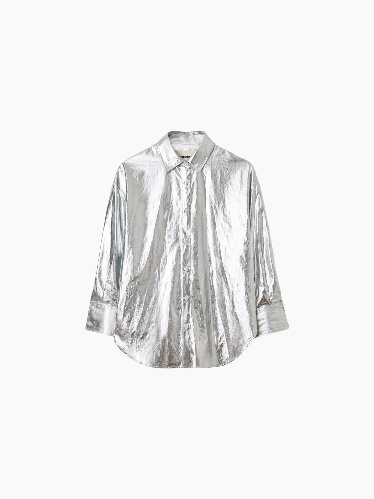 Introducing the Cotton & Silk Shirt Silver by Cordera, a long-sleeved button-down with a crisp collar and slightly rounded hem. Made from a luxurious blend of cotton and silk, the fabric boasts a shiny, reflective texture that lends the shirt a futuristic appearance. With its oversize fit and cuffed sleeves, this shirt looks unworn and neatly pressed for an effortlessly stylish look.