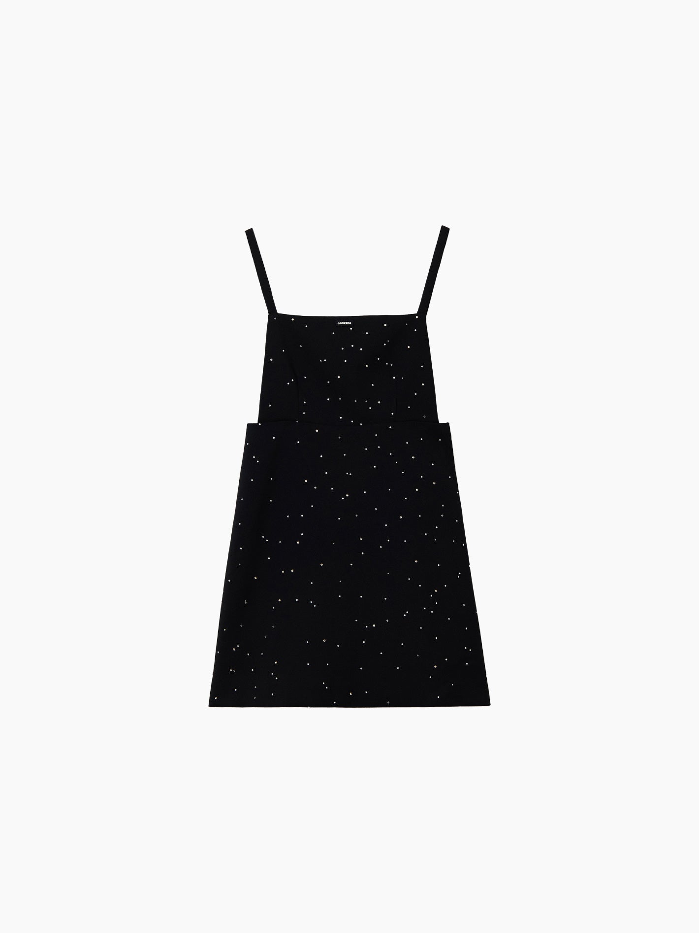 The Embellished Mini Dress Black by Cordera is a black sleeveless dress adorned with thin straps and small white star-like patterns scattered across the fabric. It features an open back, a square neckline, and an A-line silhouette.