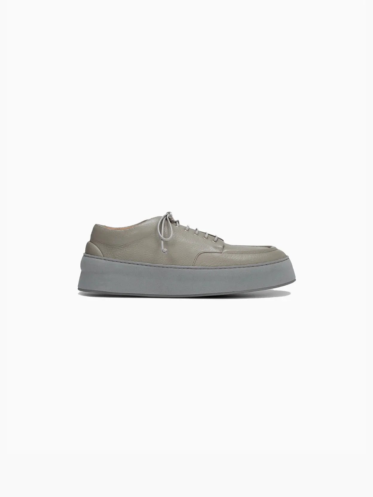 A single beige Cassapana Derby Asphalt sneaker by Marsèll with a thick, gray sole is shown against a plain white background. The shoe, available at Bassalstore in Barcelona, features a lace-up design with matching beige laces and a minimalist, modern silhouette.
