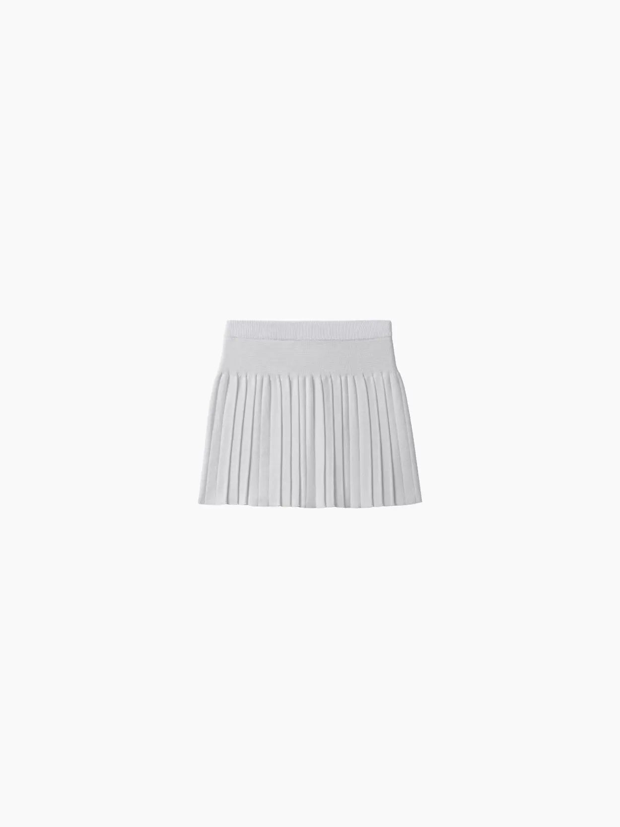 A Cotton Pleated Skirt White by Cordera, showcased against a plain light gray background, features a fitted waistband and multiple sharp pleats creating a structured and stylish look. Find this chic piece at Bassalstore in Barcelona.