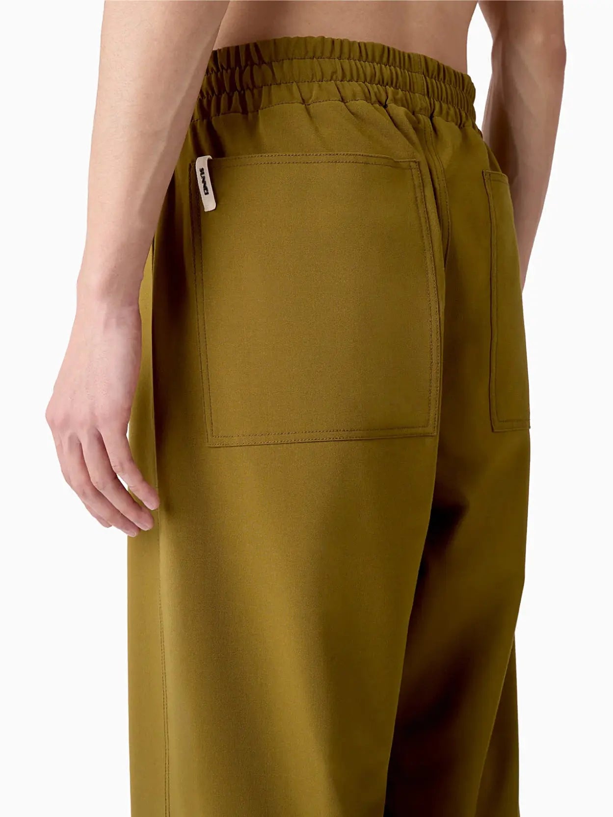 A pair of olive green, high-waisted Elastic Pants Olive Green with an elastic waistband and straight legs. The pants, available at bassalstore from the brand Sunnei, are laid flat against a plain white background.