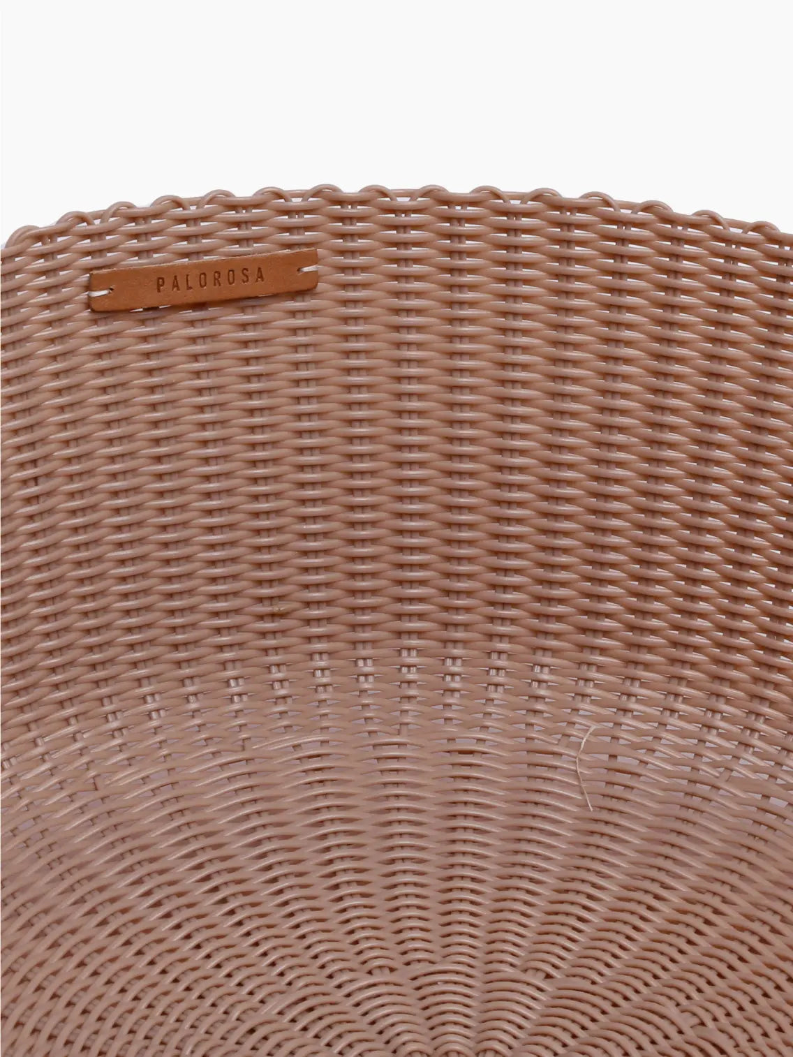 A round, shallow basket made of beige synthetic material with a woven pattern. The basket features a textured design and smooth edges, suitable for decorative or storage purposes. Available at Bassalstore in Barcelona, the Palorosa Fruit Basket Large Powder is placed against a plain white background.