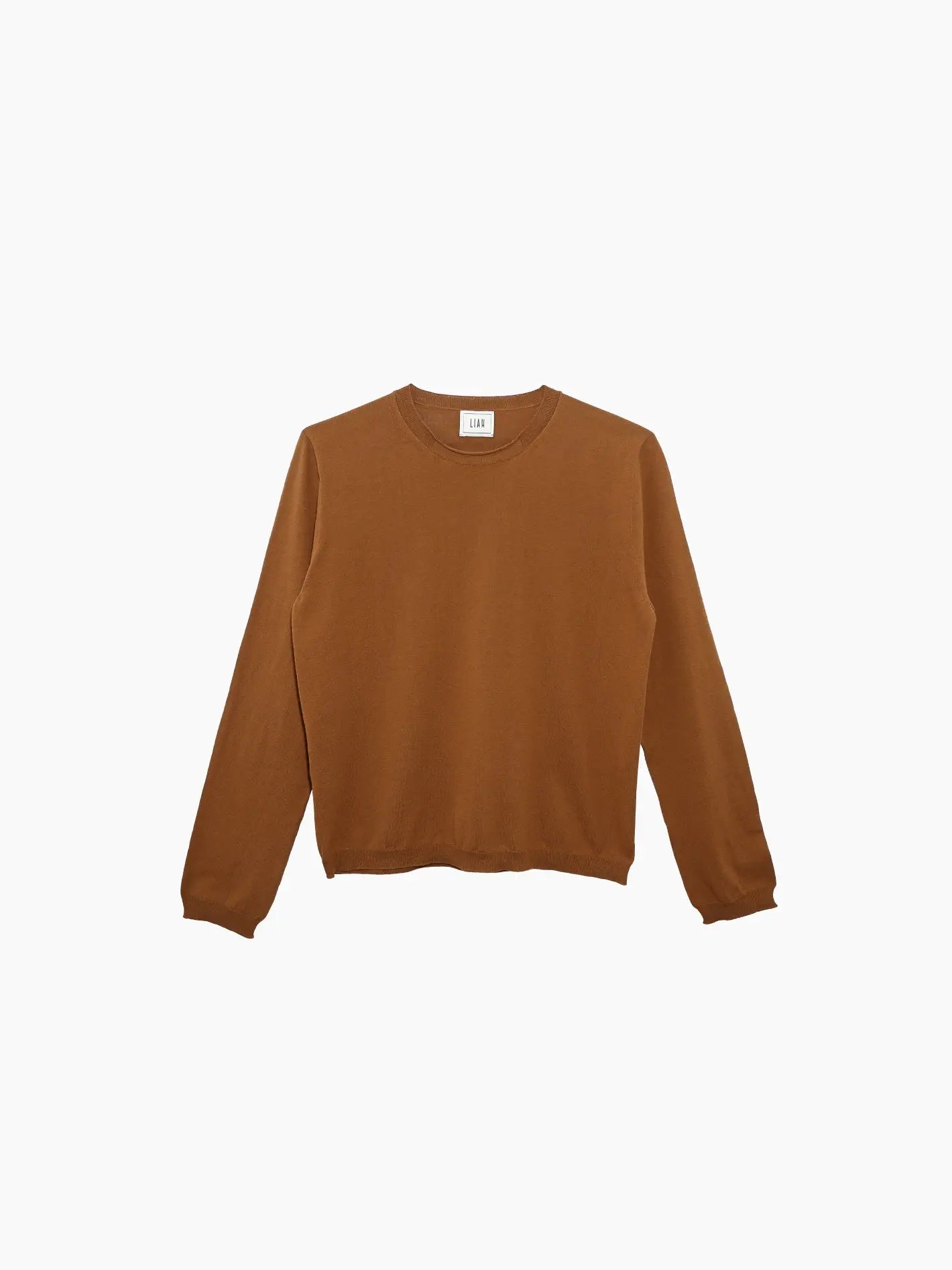A Giada T-Shirt Caramel by Liah. This long-sleeve, crew neck sweatshirt in a brown shade is plain with ribbed cuffs and hem, featuring a simple design with no visible logos or patterns. Available at Bassalstore in Barcelona. The background is white.