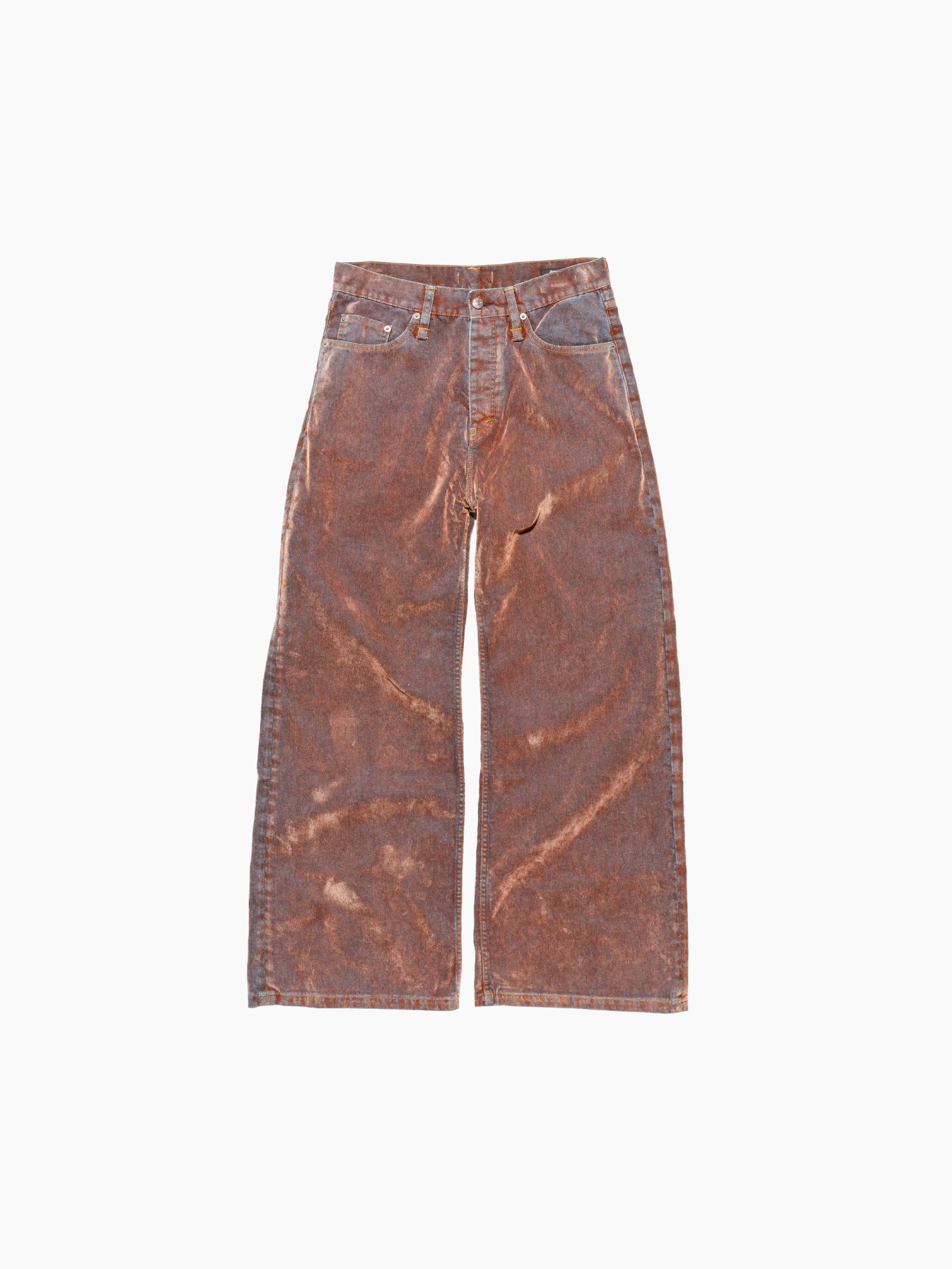 The HOPE Skid Jeans in Rust Flock are vintage-style, wide-legged brown jeans made from Organic Cotton with a faded finish and high waist. They feature classic five-pocket styling and prominent stitching, and are displayed laid flat against a white background.