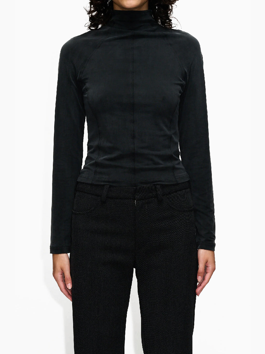 Hope's Trim LS Black Washed Cupro top, featuring a long-sleeve, high-neck design with a slightly wrinkled texture and a washed silky look, laid flat on a white background.