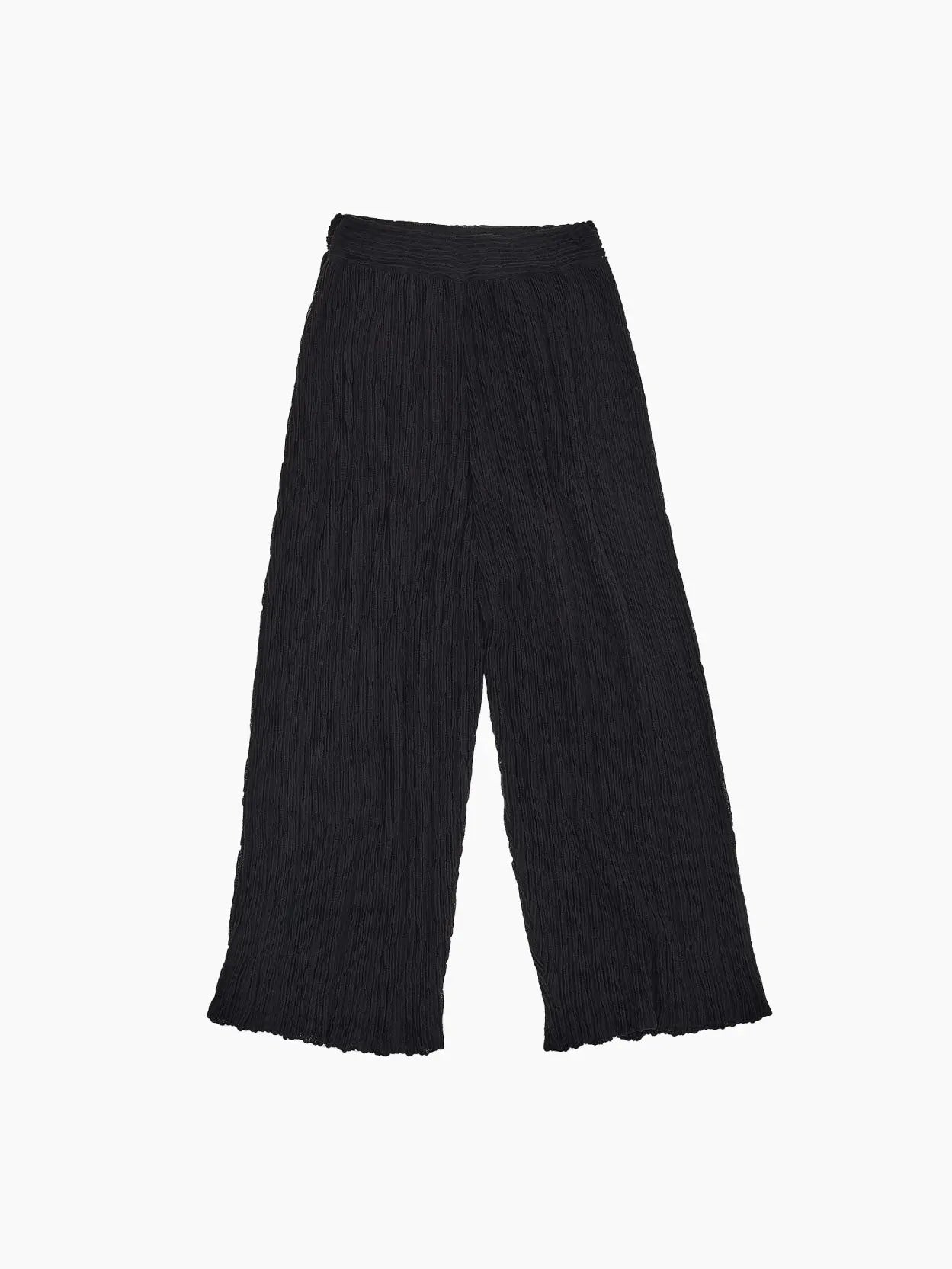 A pair of black, wide-leg pants featuring a crinkled texture and an elastic waistband, laid flat on a white background, available exclusively at Bassalstore in Barcelona. The product name is Hasami Pants Black by the brand Rus.