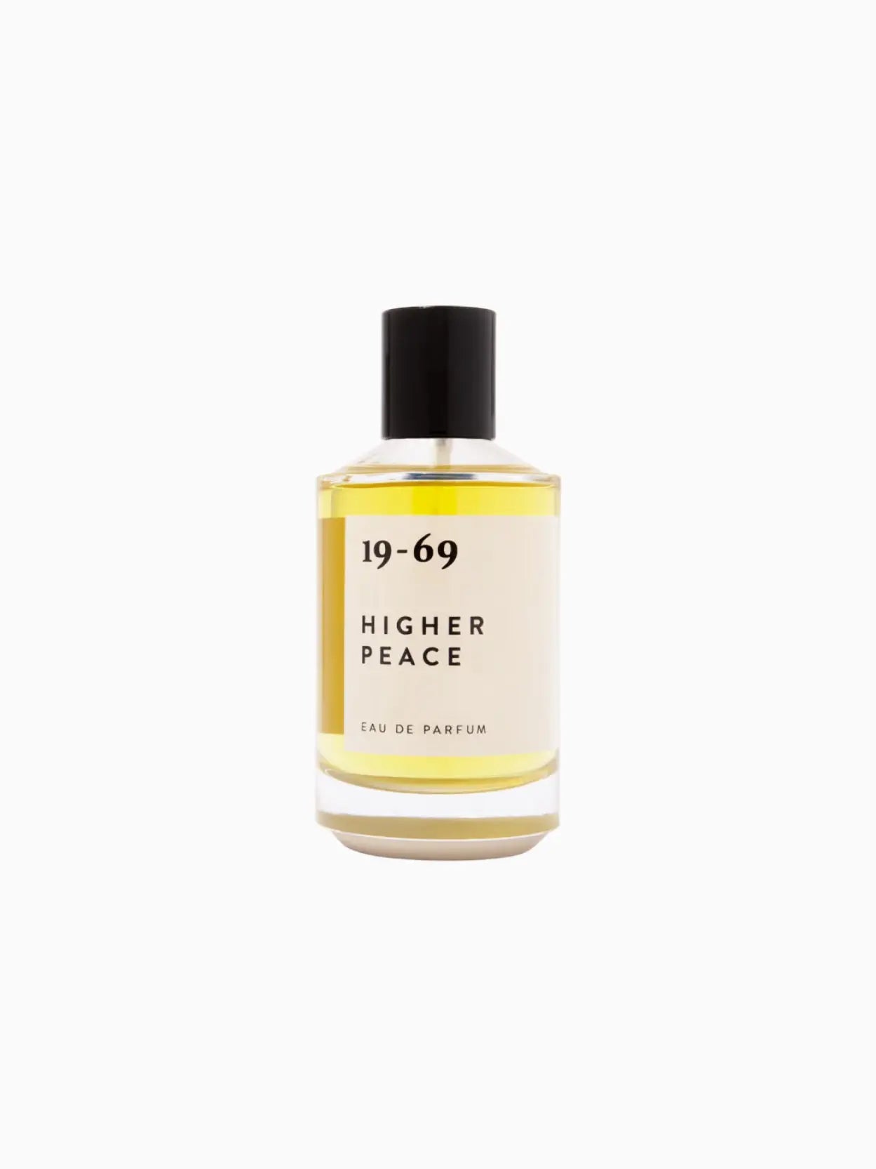 A bottle of perfume with a yellow liquid inside. The label reads "Higher Peace 100ml." The bottle, available at Bassalstore in Barcelona, features a black cap and minimalist design against a plain white background.