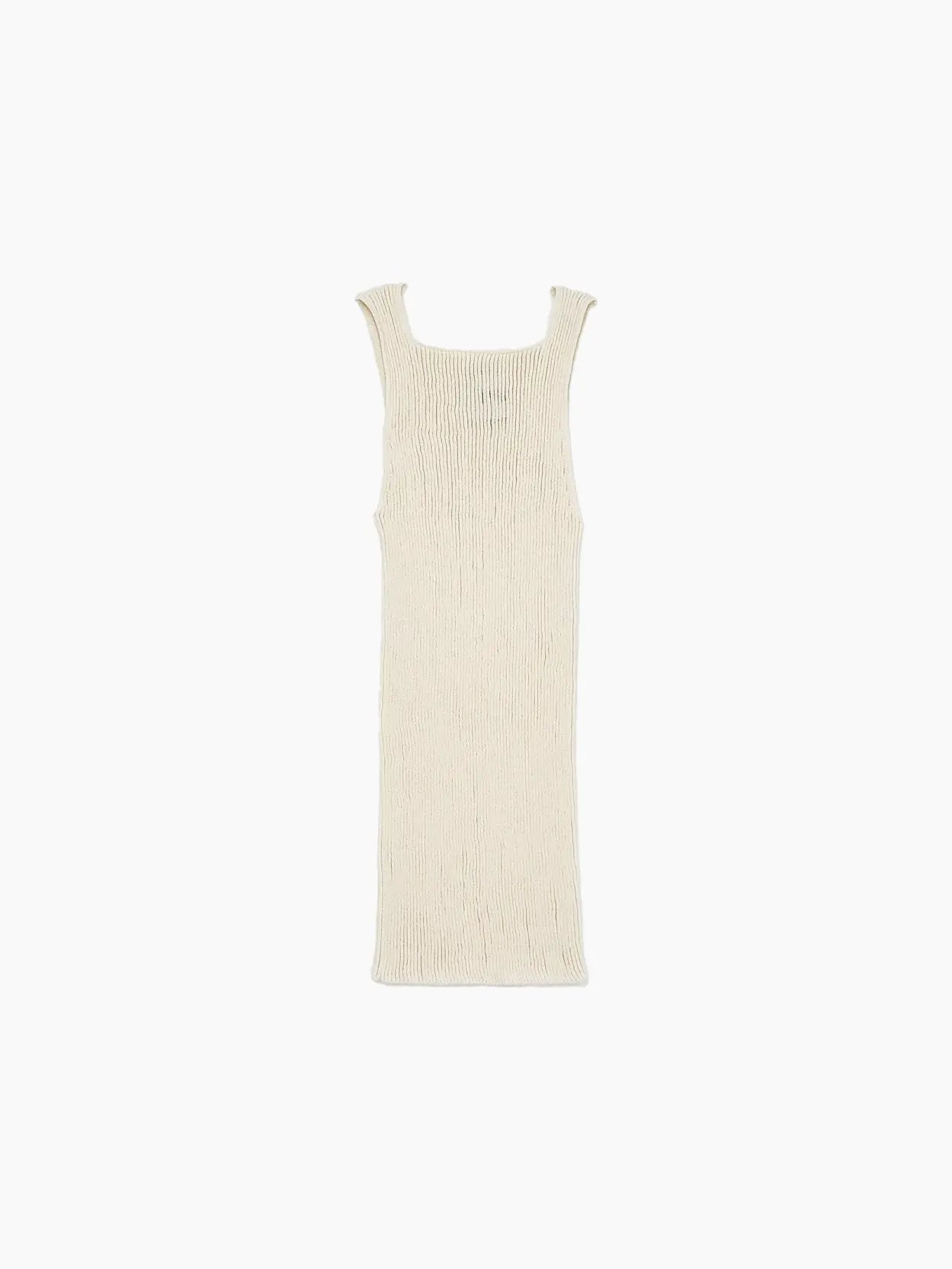 A sleeveless, knitted, cream-colored Junko Top Chalk by Rus is displayed against a white background. The top has a simple, straight cut and a square neckline, perfect for a summer stroll in Barcelona. Available now at Bassalstore.