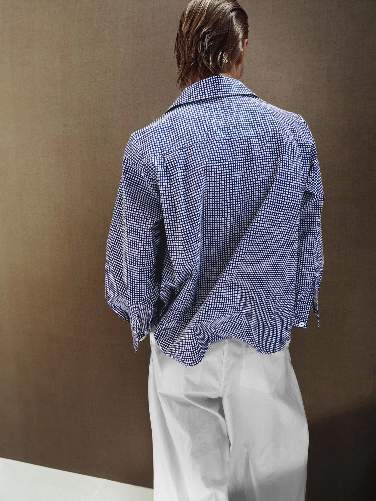A Jan Machenhauer Kika Shirt Block Print Check with a collar and six white buttons down the front. The shirt, available at bassalstore in Barcelona, features a straight hem and is neatly spread out, viewed from the front against a plain white background.