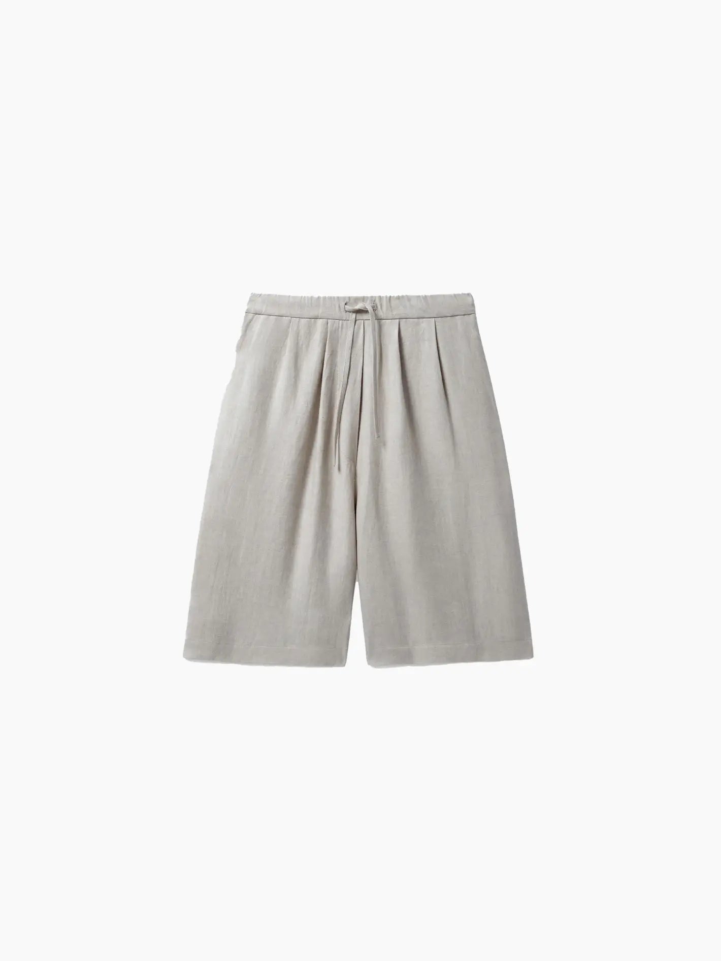 A pair of Cordera Linen Maxi Bermuda Toasted shorts with an elastic waistband and a drawstring tie. The shorts are knee-length with a slightly relaxed fit, perfect for strolling through the streets of Barcelona.