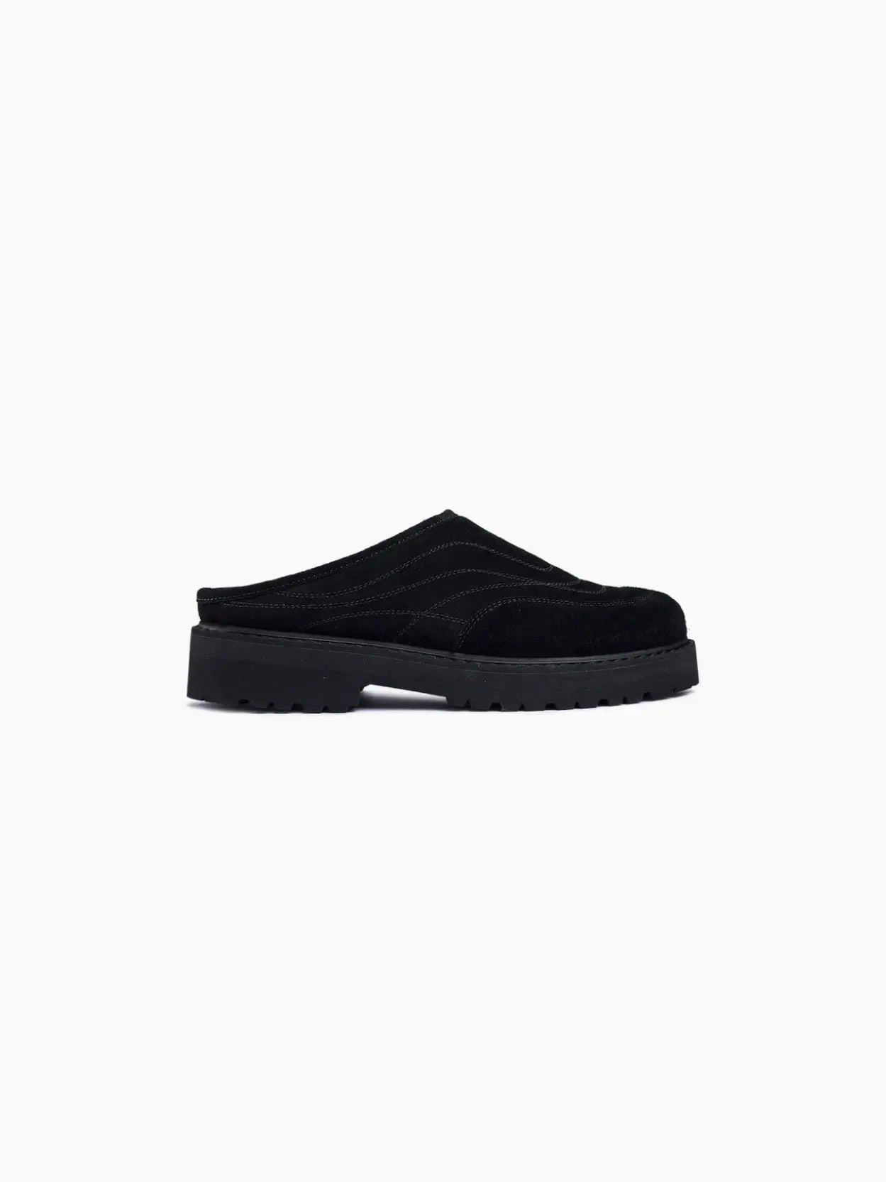 A single Maggiore Black Suede slip-on clog by Diemme with visible stitching and a thick black sole, viewed from the side against a white background, reminiscent of the chic style found in a Barcelona store.