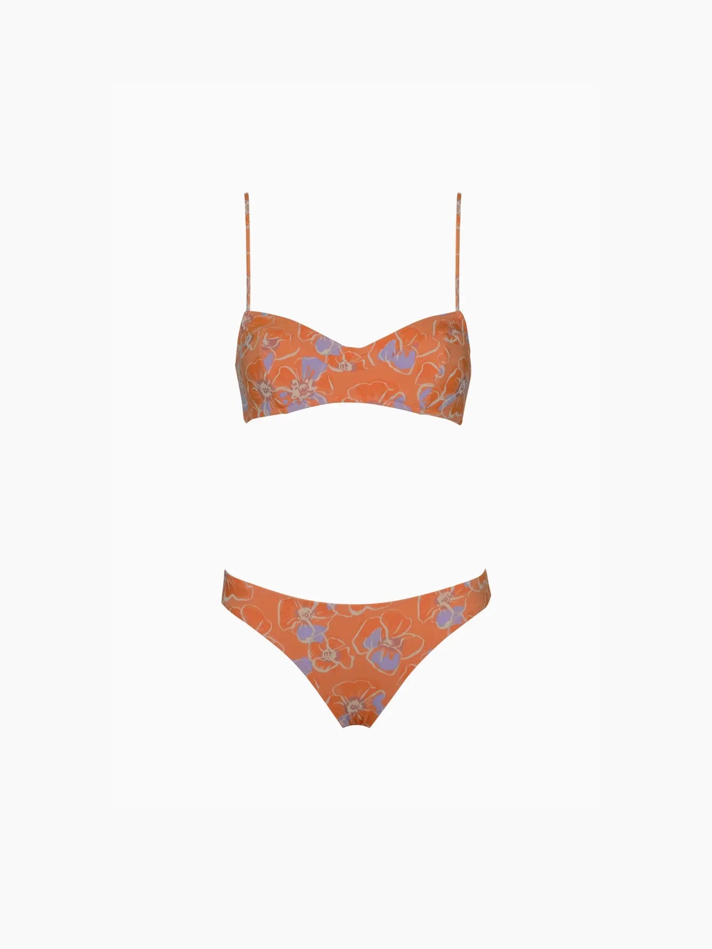 A Marais Bikini Mandarina with thin shoulder straps and a floral pattern. The top is a bandeau style, and the bottoms are classic bikini-cut. The floral design features shades of blue and white. Displayed against a plain white background, this stunning piece from Pale is available at Bassalstore in Barcelona.