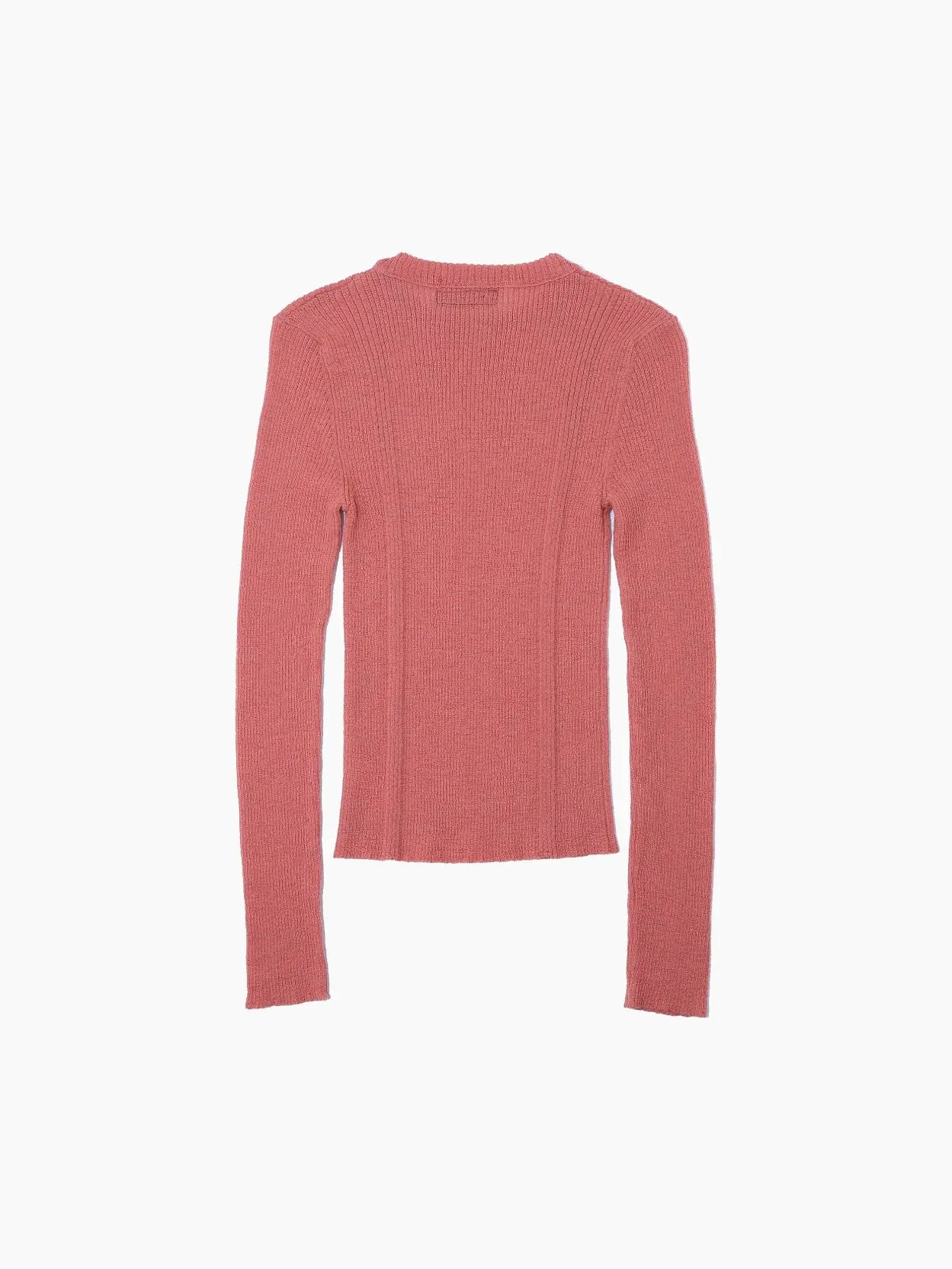 A ribbed, long-sleeve sweater in a dusty rose color is displayed against a white background. The fitted style features vertical ribbing patterns for texture and a round neckline. A small fabric tag is visible on the inside back of the neckline, available exclusively at Bassalstore in Barcelona. Product: Masla Long Sleeve Coral by Bielo.