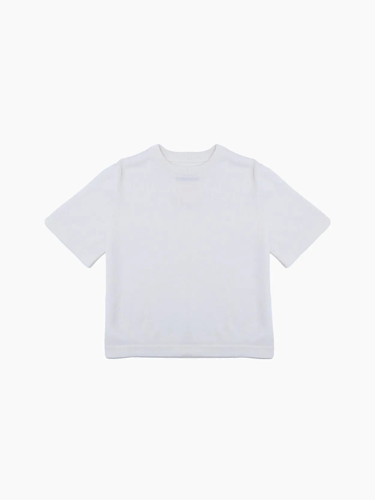 A plain white short-sleeve Merino Wool T-Shirt from Cordera is displayed against a white background. The T-shirt, available at this trendy Barcelona store, features a round neckline and a simple, clean design with no visible logos or patterns.