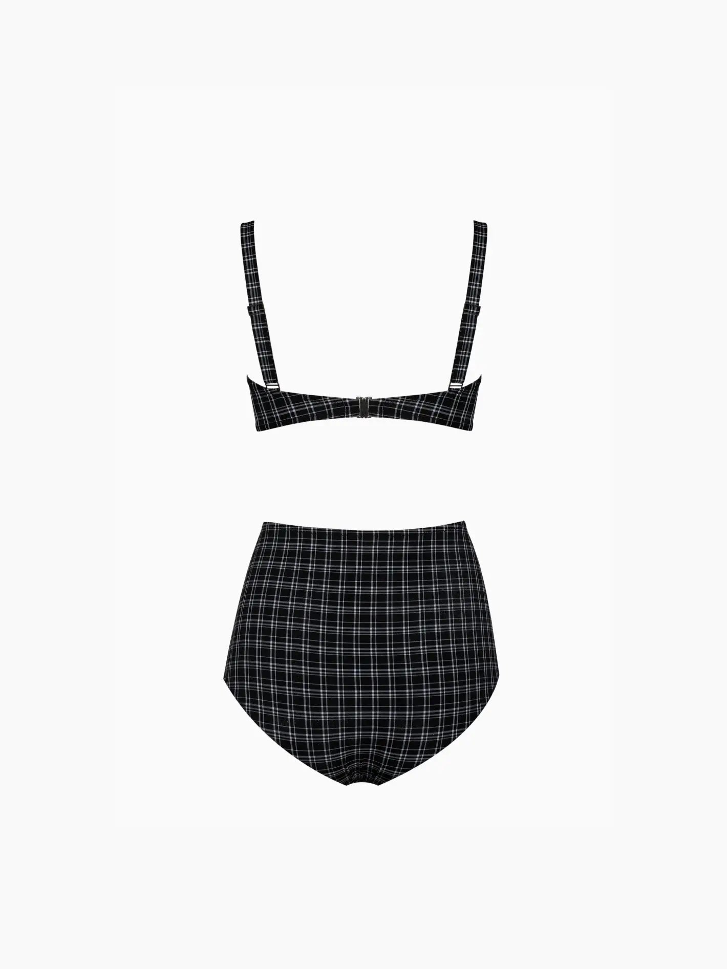 A black and white checkered two-piece swimsuit from Bassalstore in Barcelona, the Mila Bikini B&W by Pale, features a high-waisted bottom and a top with thin shoulder straps. The pattern consists of horizontal and vertical white lines forming a grid, displayed on a plain white background.