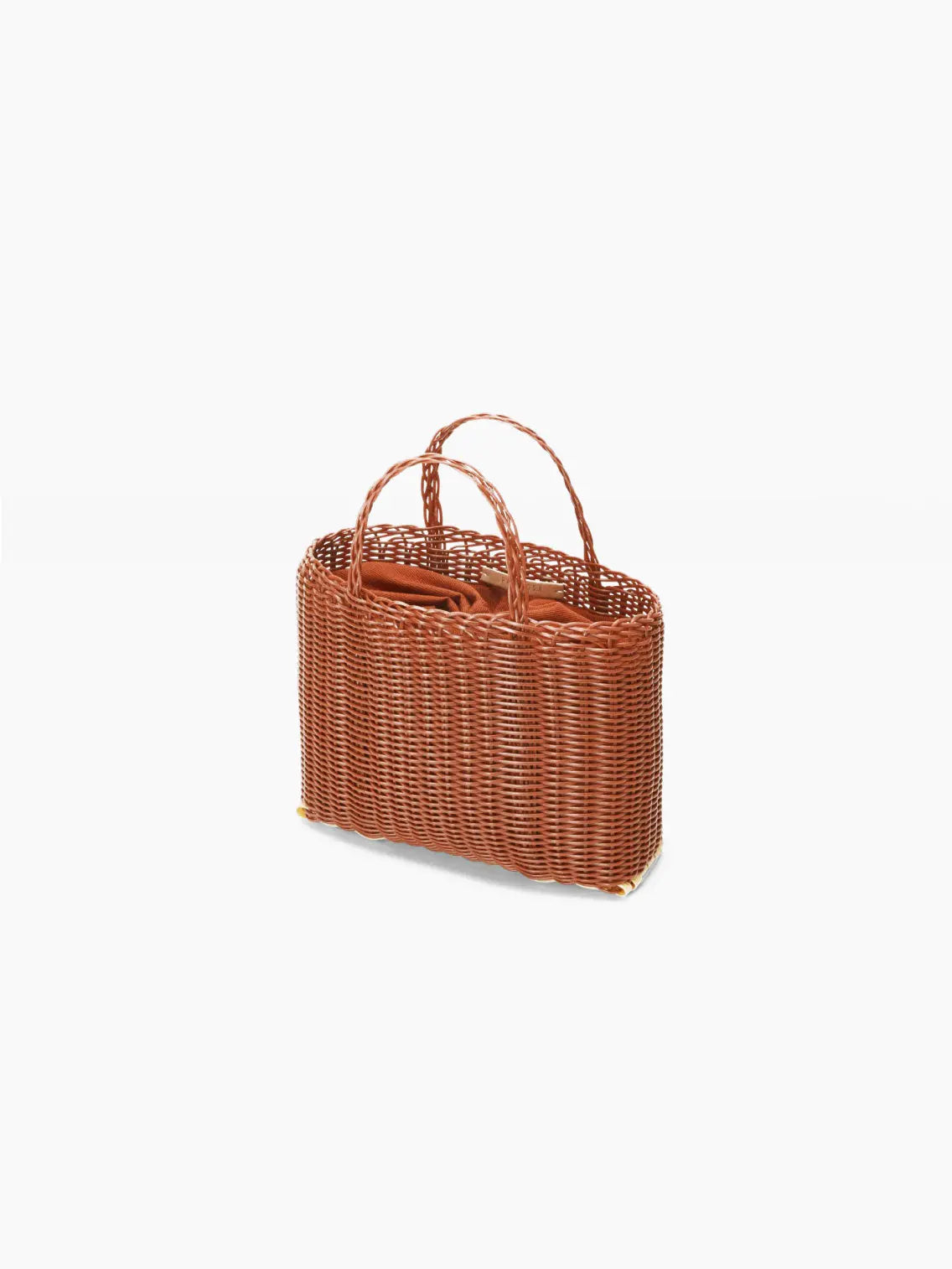 A rectangular, woven rattan handbag with a warm brown color is shown against a white background. It features a single loop handle on top, made of the same material. This chic accessory from Palorosa seamlessly blends style with functionality, perfect for any outing in Barcelona.
