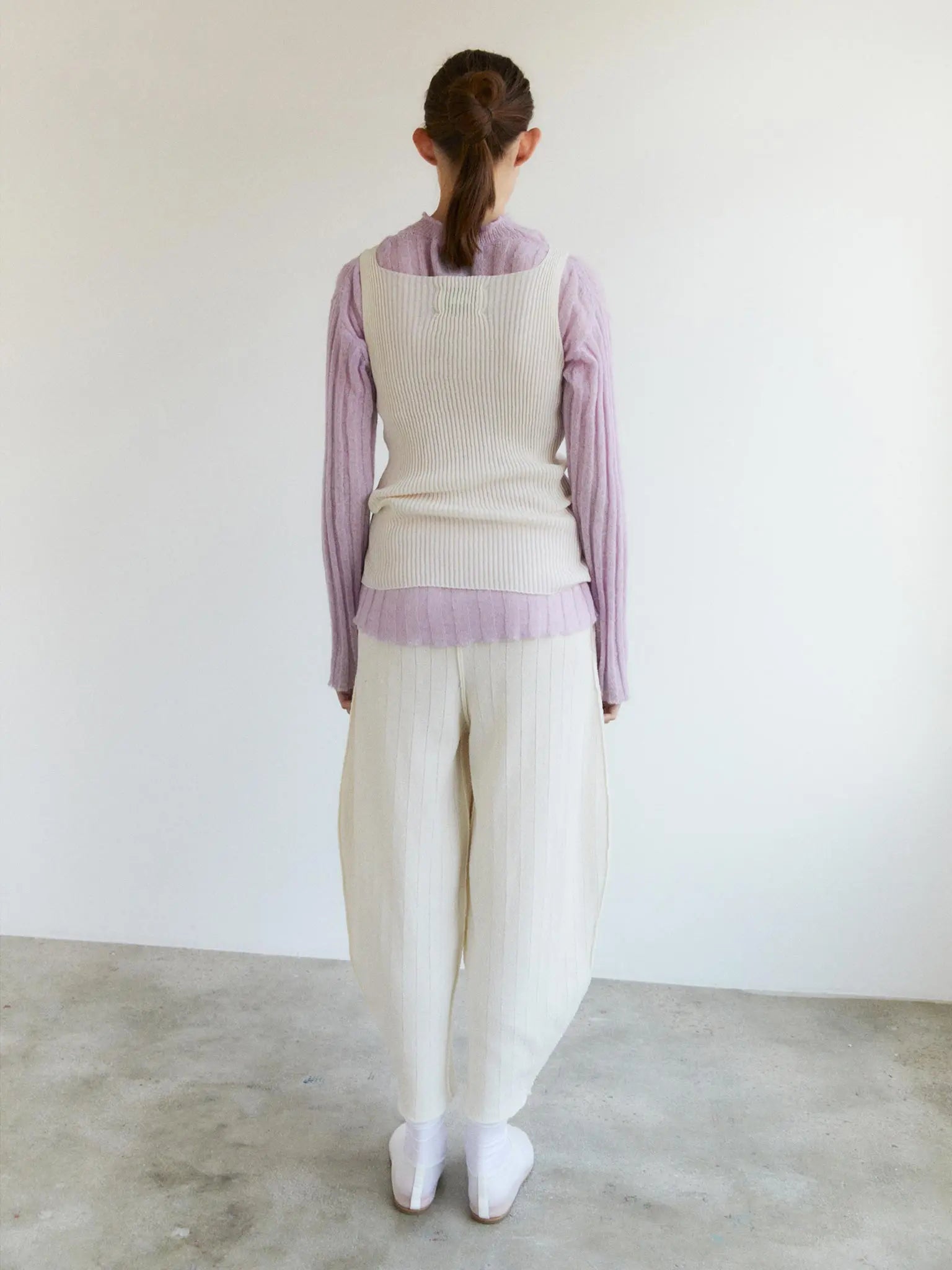 An image of a pair of Ohirune Pants Chalk from Rus. The pants feature an elastic waistband and a relaxed fit, lying flat on a plain white background.