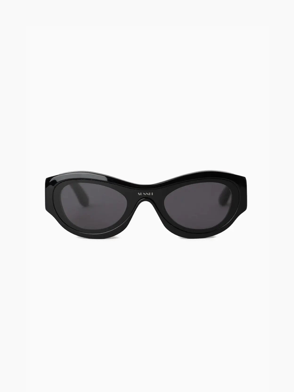 A pair of Prototipo 5 Sunglasses Black with dark lenses, featuring a subtle "Sunnei" logo on the left lens, available at Bassalstore in Barcelona.
