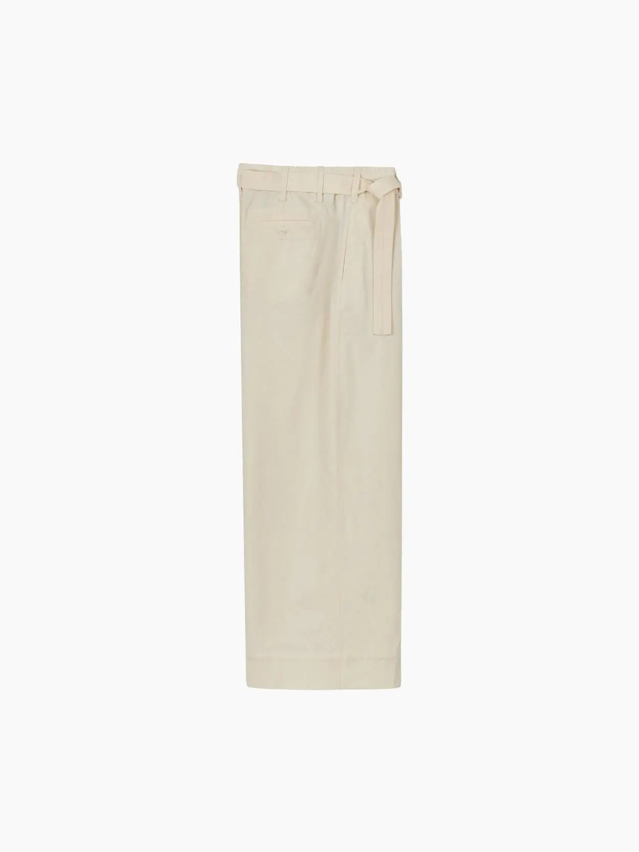 A pair of Rachel Pants Natural by Jan Machenhauer with a fabric belt at the waist, shown against a plain white background. Available exclusively at Bassalstore in Barcelona, the pants feature a minimalist design with subtle pleats and clean lines.