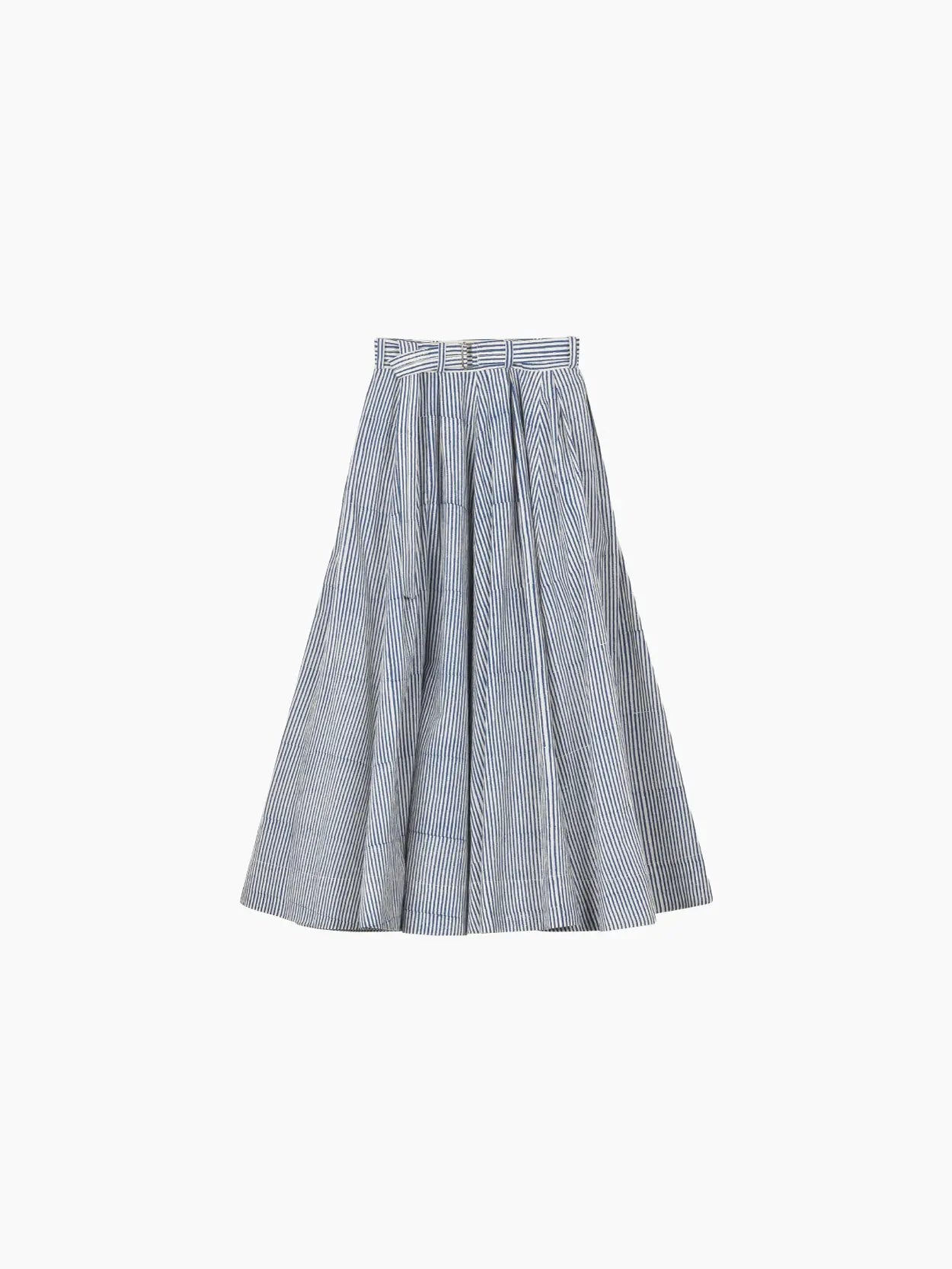 The Schrol Skirt Block Print Stripe by Jan Machenhauer is a high-waisted, A-line skirt with a full, pleated design. It features a thin, vertical pinstripe pattern in shades of blue and white. The skirt has a fitted waistband and extends to a midi length. The style is classic and elegant—available exclusively at Bassalstore in Barcelona.