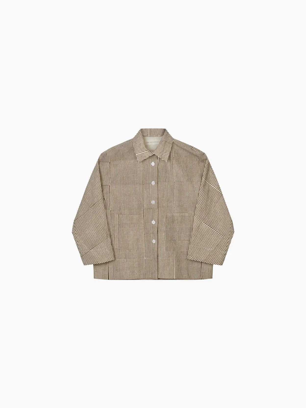 A beige and white striped button-up shirt with long sleeves is laid flat against a white background. The Thyme Shirt Block Print Stripe by Jan Machenhauer, available at Bassalstore in Barcelona, features a classic collar and five white buttons down the front.