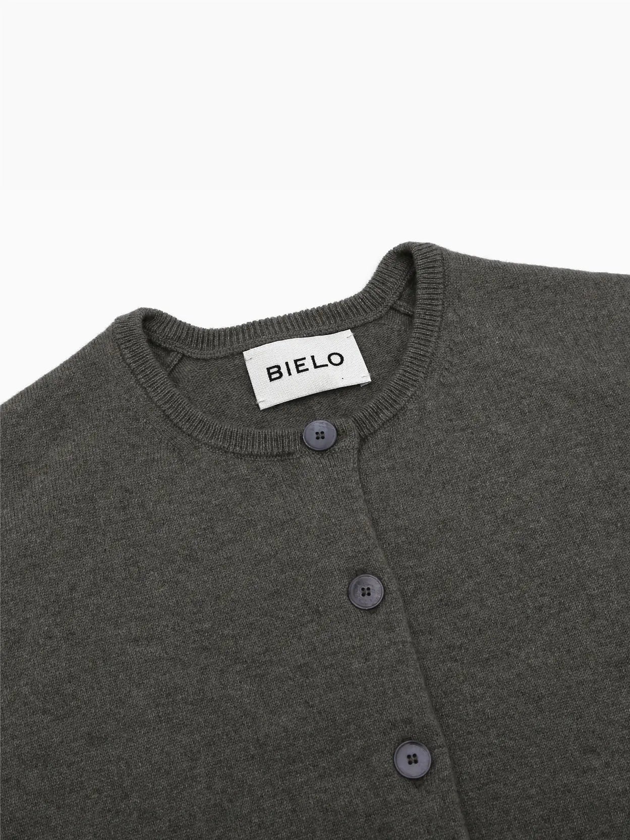 A Uba Vest Khaki by Bielo is displayed against a white background. Available at Bassalstore in Barcelona, the vest features a button-up front with multiple black buttons and a round neckline.