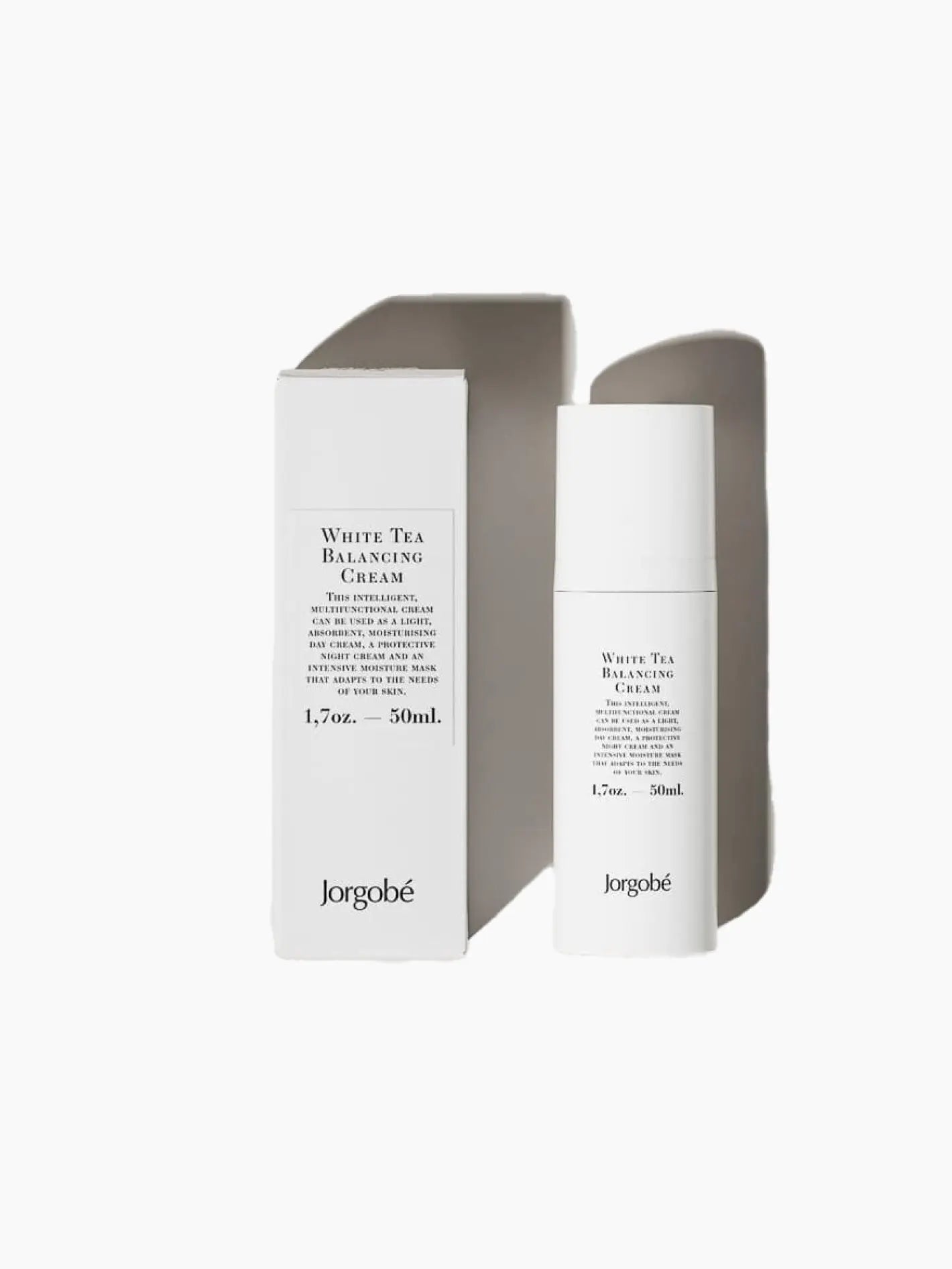A white rectangular bottle labeled "White Tea Balancing Cream 50ml." stands next to its matching box, both branded with "Jorgobé" at the bottom. Available at Bassalstore in Barcelona, the text on both the bottle and box provides details about the product, which is 1.7 oz. or 50 ml in size.