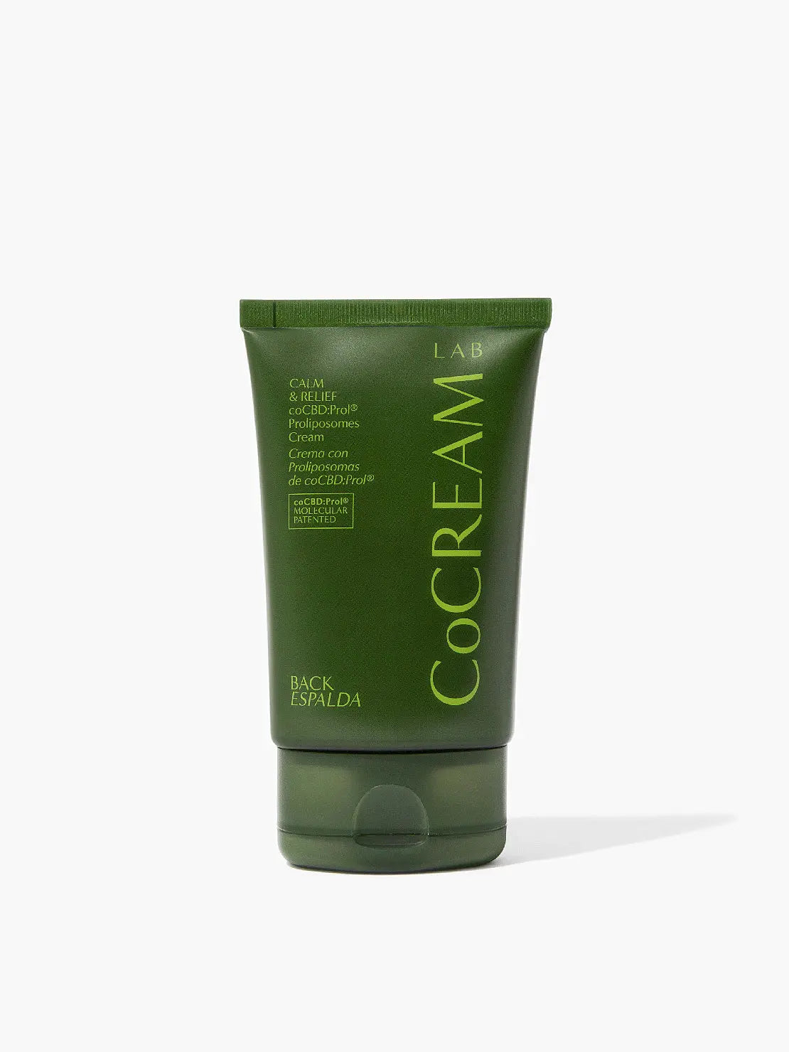 A green squeeze tube labeled "CoCream Lab" containing Back Cream 100ml is sold at Bassalstore in Barcelona. The text on the tube includes information in Spanish, mentioning features like "Calm & Relief" and "Crema con Polipéptidos." The packaging design is simple and minimalistic.