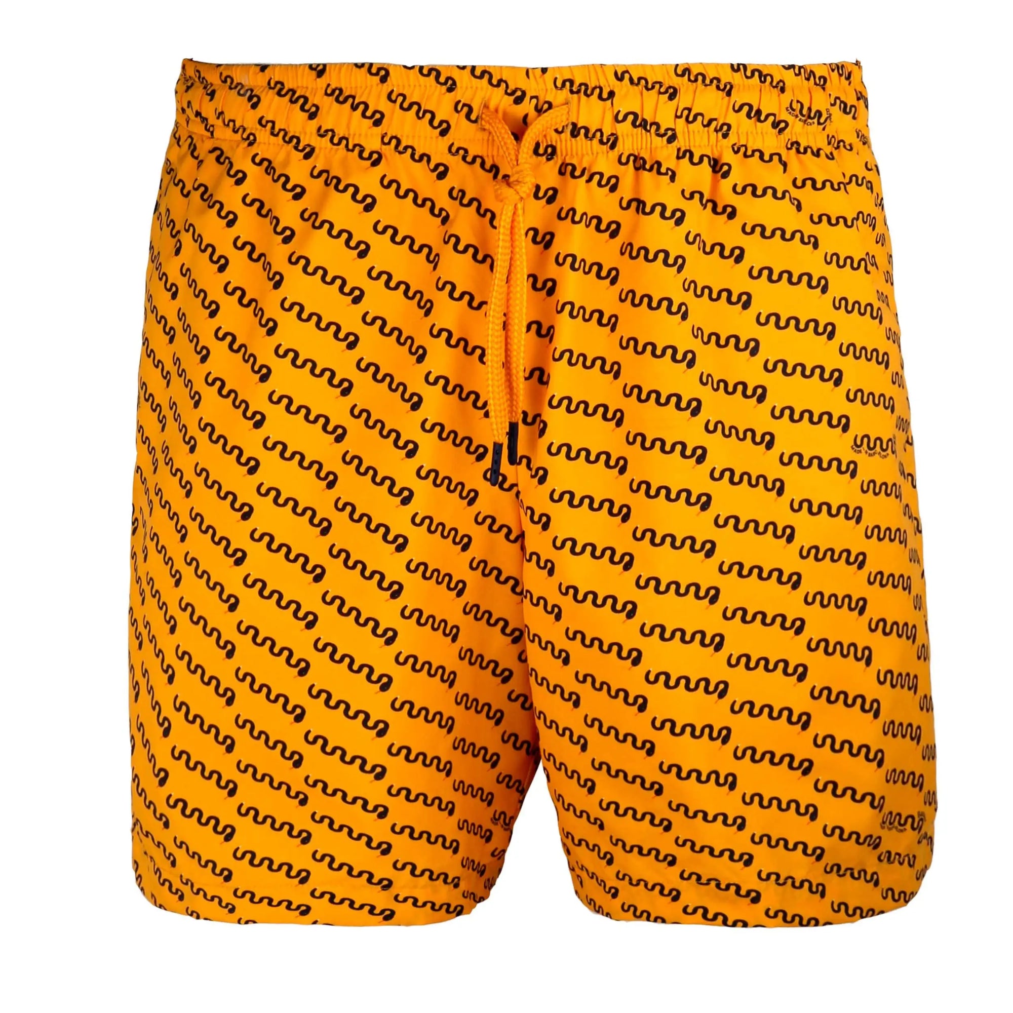 An open white box from bassalstore reveals a folded yellow Mamba Swimwear patterned with dark squiggly lines. The Mamba Swimwear has a blue drawstring and two tags: one reads "Bassal." and the other says, "proudly made for you to wear." The box lid proudly displays the brand name "Bassal" from Barcelona.