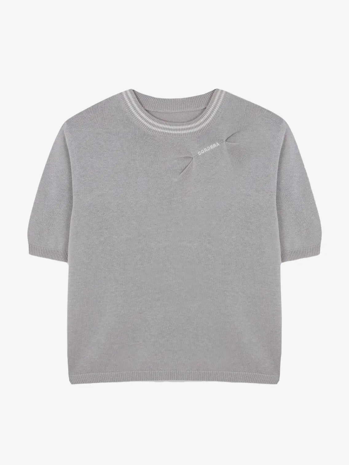 A light gray short-sleeve sweater with a round neckline. The Cordera Silk Logo Top Murmur features a small, subtle cut-out detail near the shoulder area and text that reads "CONDANSA" in white near the cut-out. Available at Bassalstore Barcelona, this piece also boasts ribbed hem and cuff detailing.