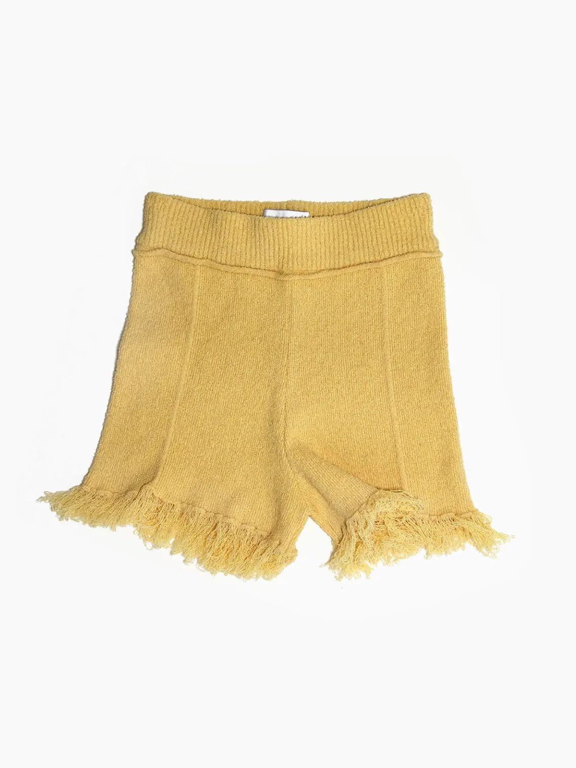 A pair of Soba Pants Yellow by Rus with a ribbed waistband and fringed hems, available at Bassalstore. The pants feature vertical seam detailing and are laid flat on a white background.
